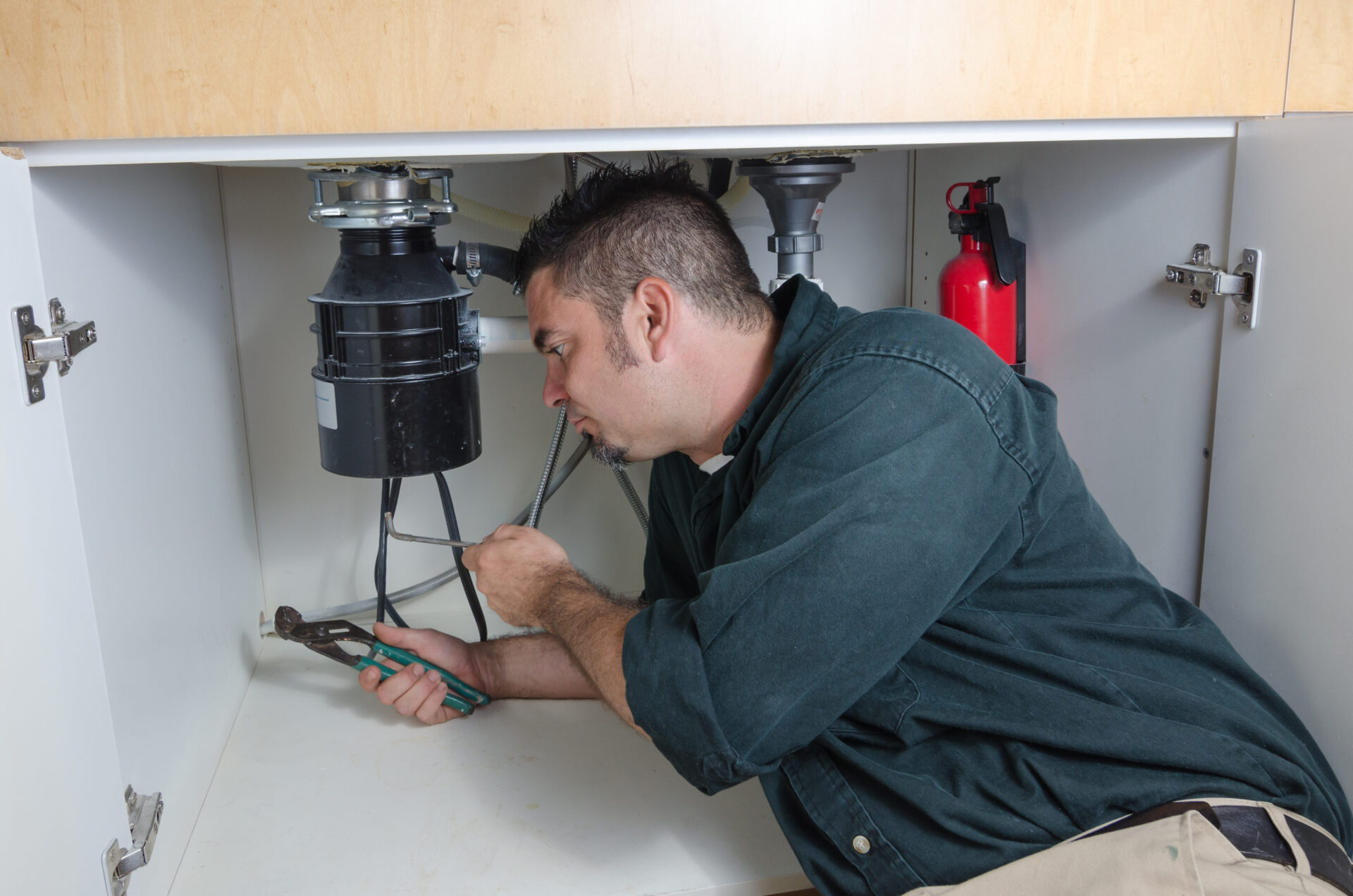 plumbing repair services, garbage disposal repair in blanco