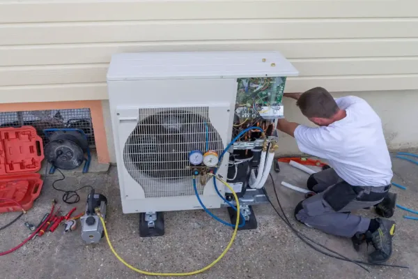 heat pump being serviced